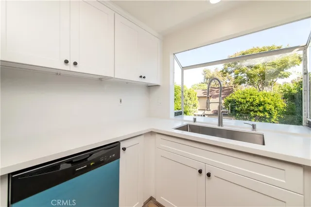 a kitchen with a stove and a microwave