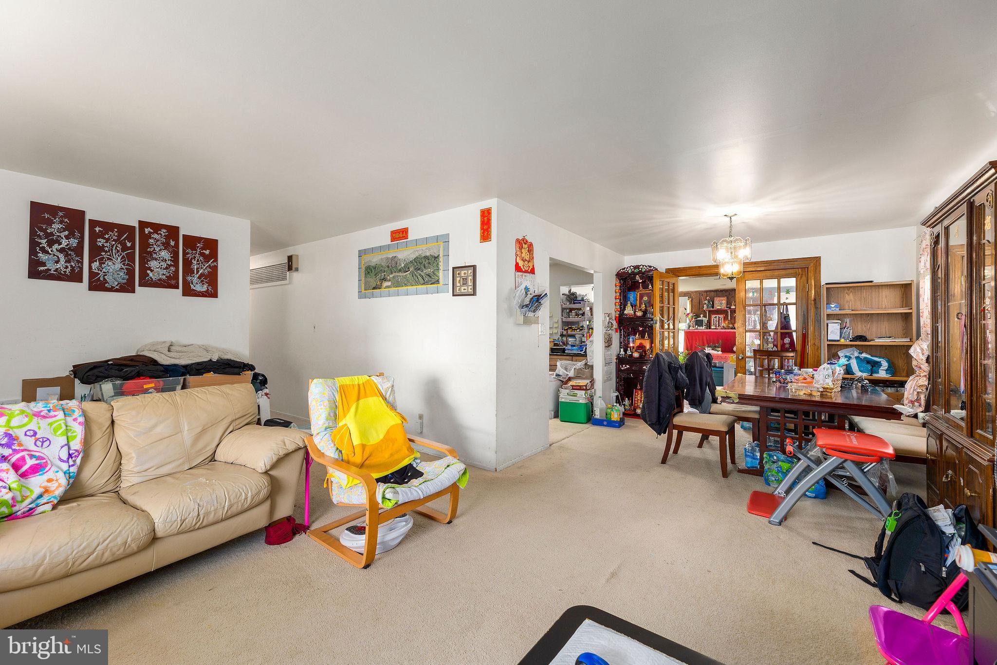 6623 Braddock Road Springfield, VA 22151 - Photo 8 of 43 a living room with furniture and gym equipment