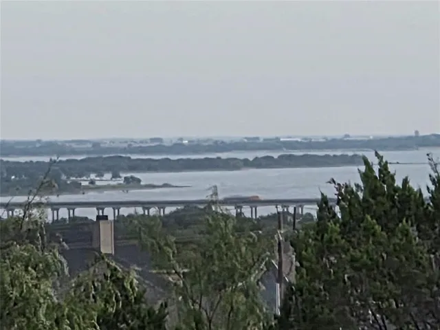 a view of a lake with a mountain in the back