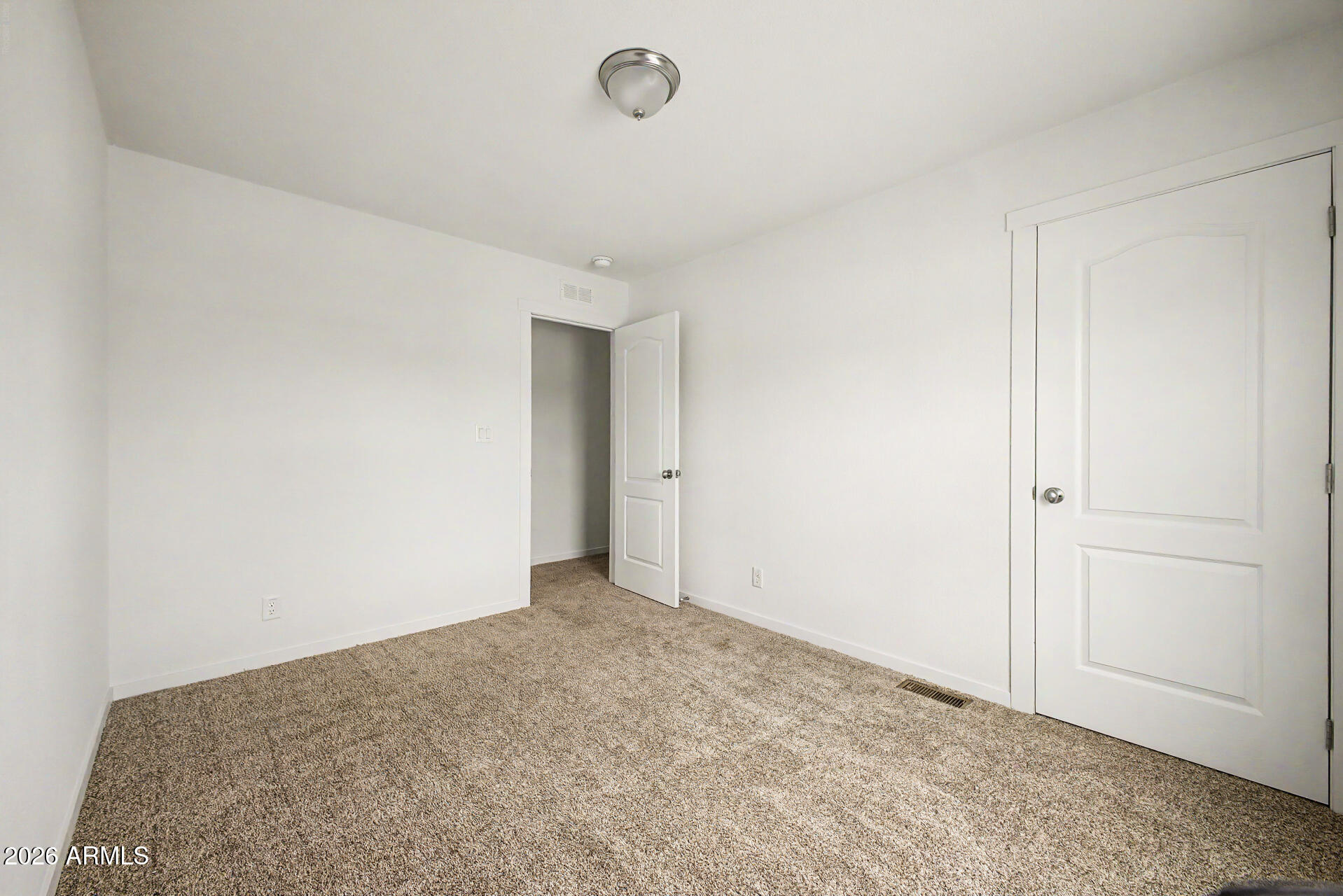 320 East McKellips Road, Unit 100 Mesa, AZ 85201 - Photo 17 of 24 a view of an empty room
