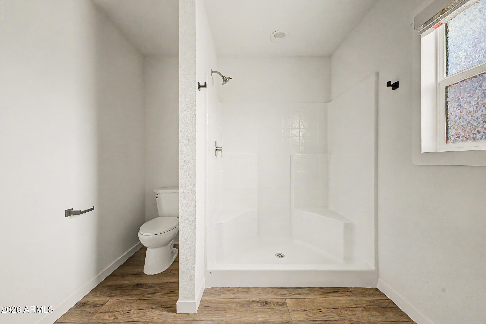320 East McKellips Road, Unit 100 Mesa, AZ 85201 - Photo 21 of 24 a bathroom with a toilet