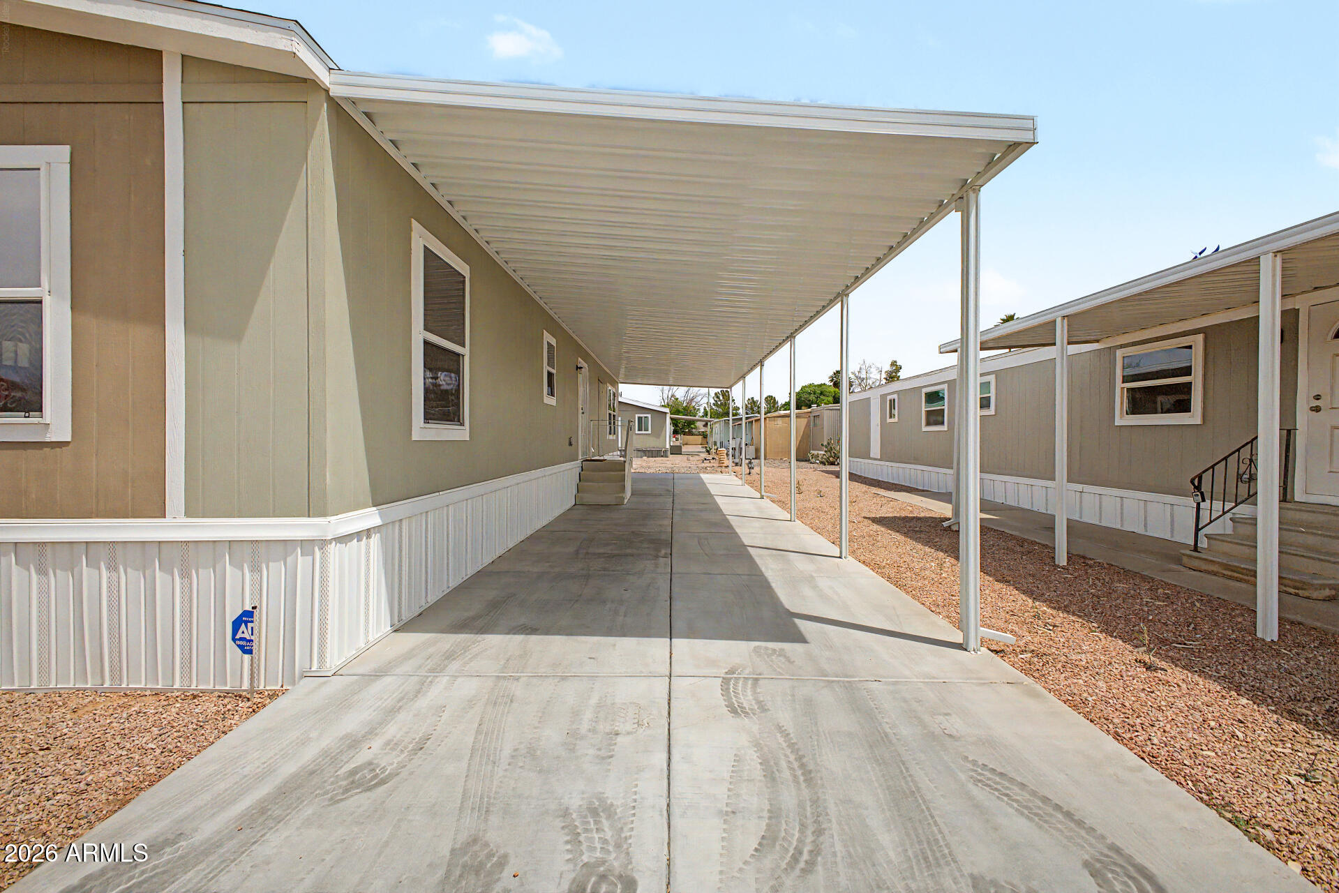 320 East McKellips Road, Unit 100 Mesa, AZ 85201 - Photo 4 of 24 a view of a porch