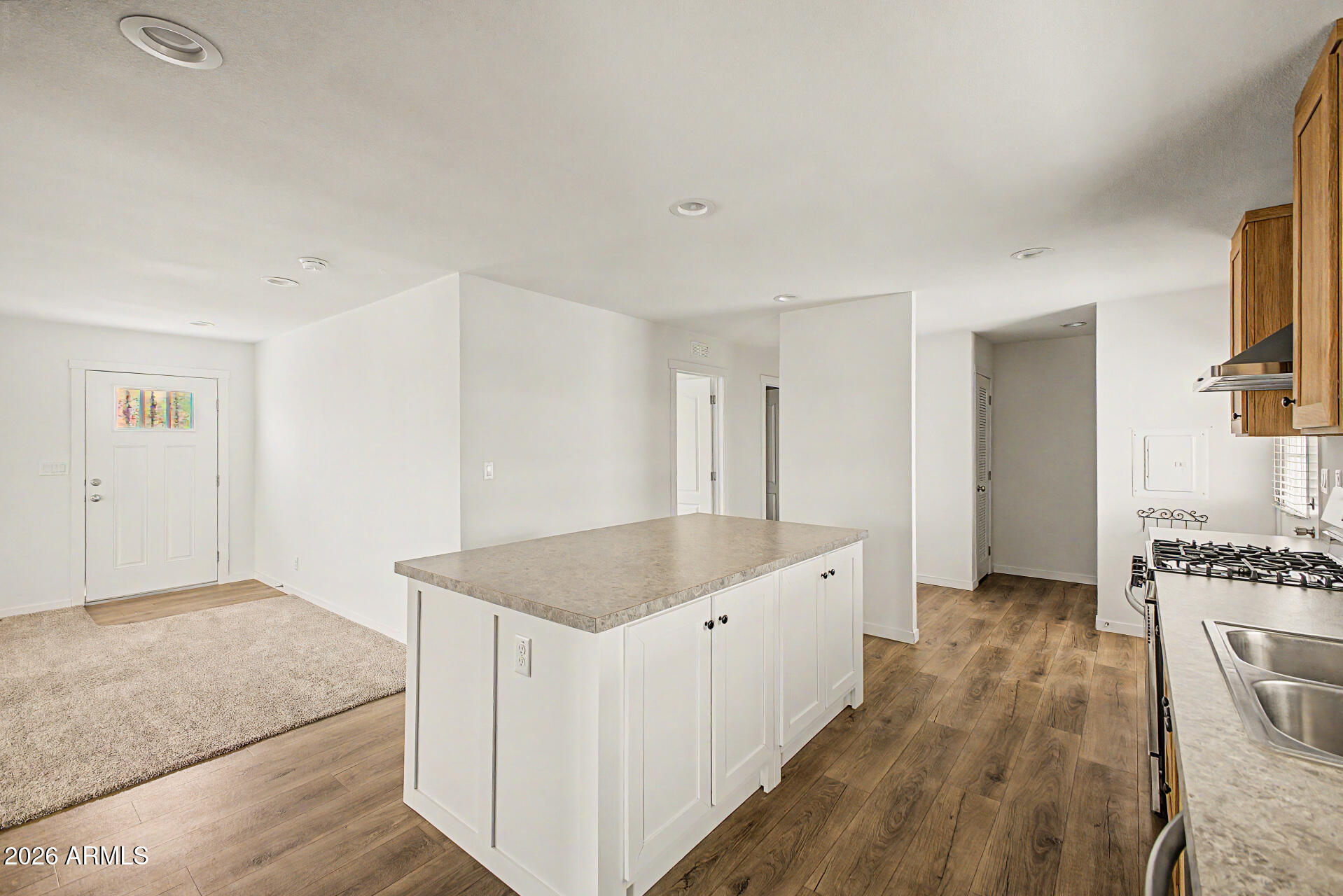 320 East McKellips Road, Unit 100 Mesa, AZ 85201 - Photo 9 of 24 a spacious bathroom with a granite countertop sink and a mirror