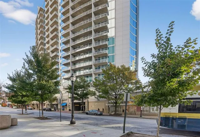a view of a building and a street