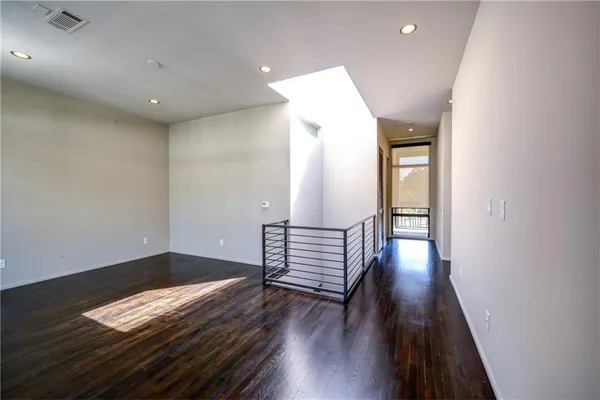 a view of entryway with wooden floor