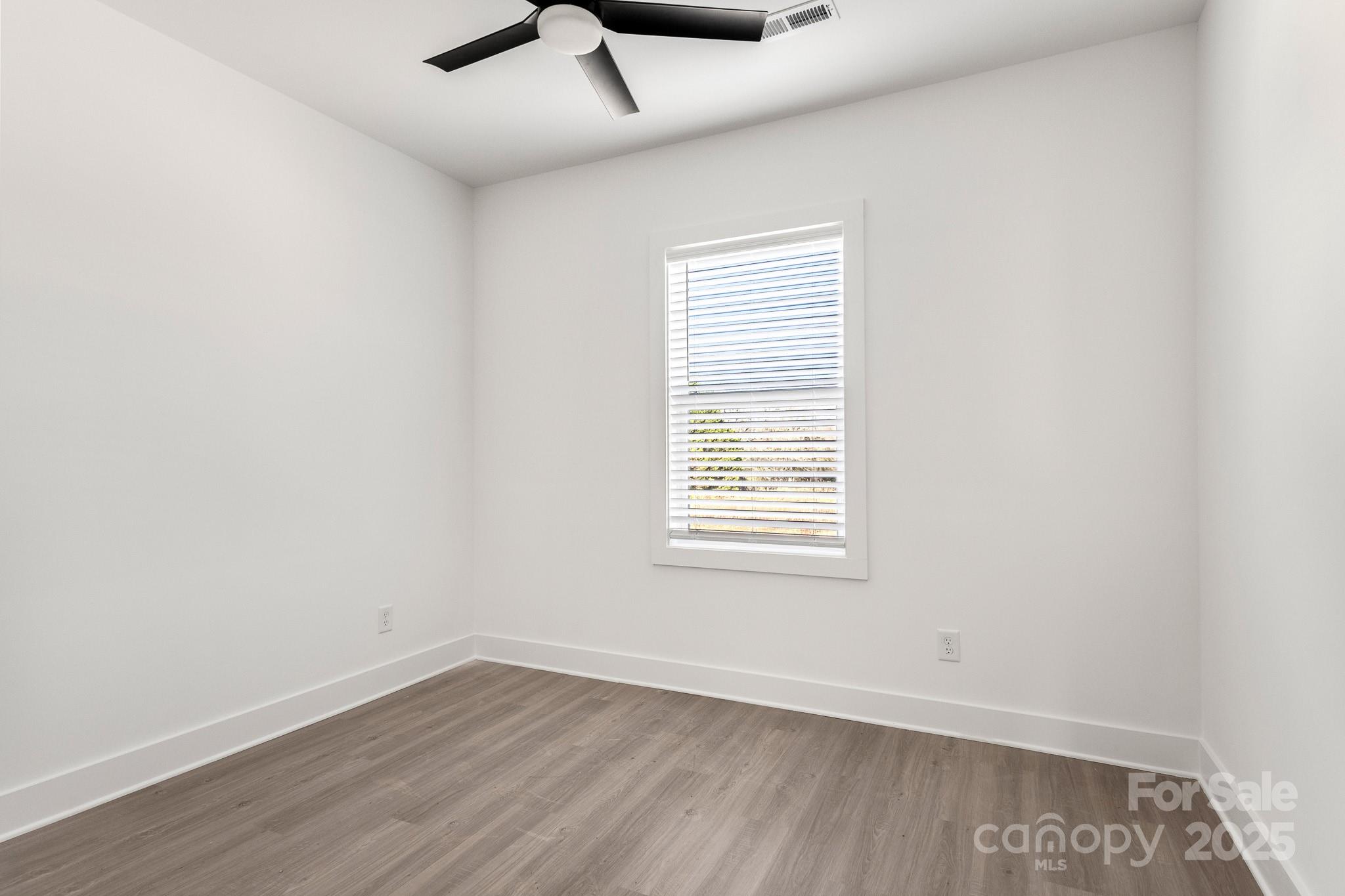 3307 Old Pageland Monroe Road Monroe, NC 28112 - Photo 20 of 35 an empty room with a window