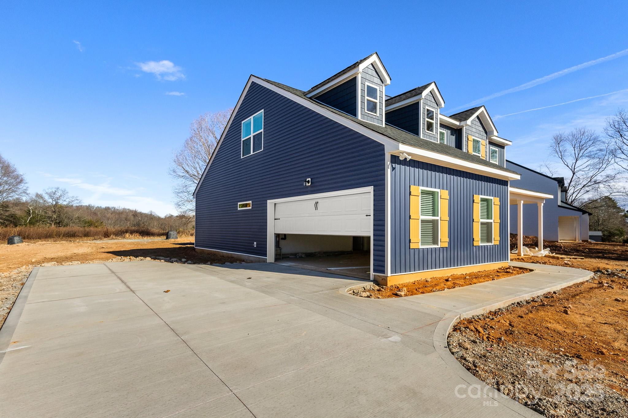 3307 Old Pageland Monroe Road Monroe, NC 28112 - Photo 32 of 35 a front view of a house with a yard