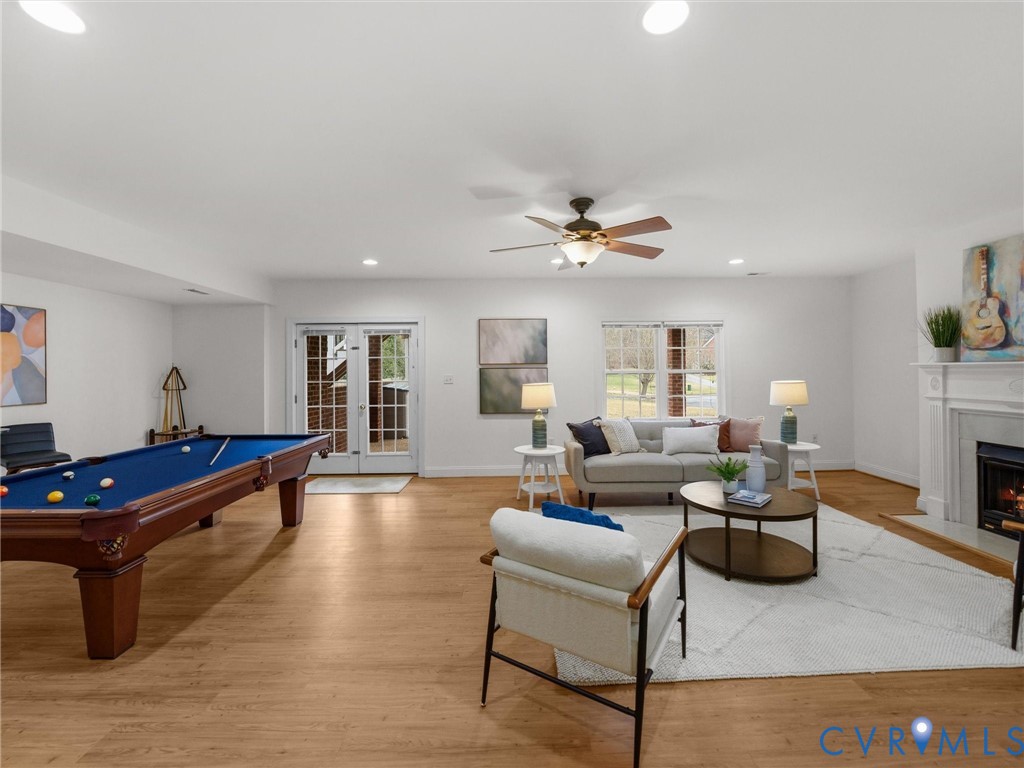 14335 Lander Road Midlothian, VA 23113 - Photo 63 of 70 a living room with furniture and wooden floor