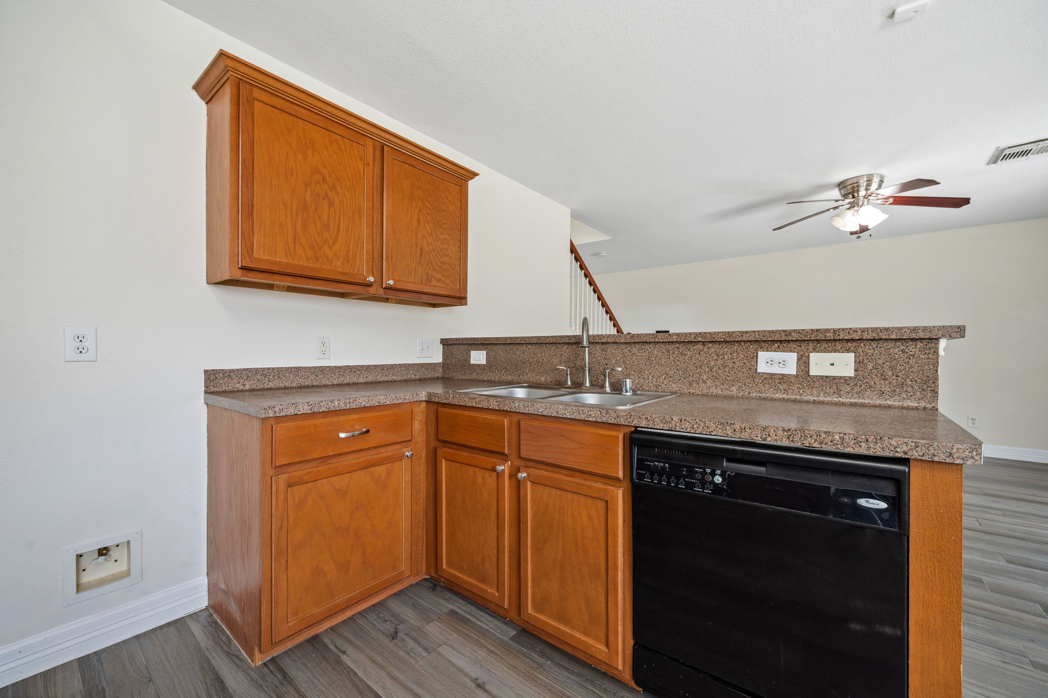 12819 Blue Timbers Court Houston, TX 77044 - Photo 13 of 26 a kitchen with a sink and a stove