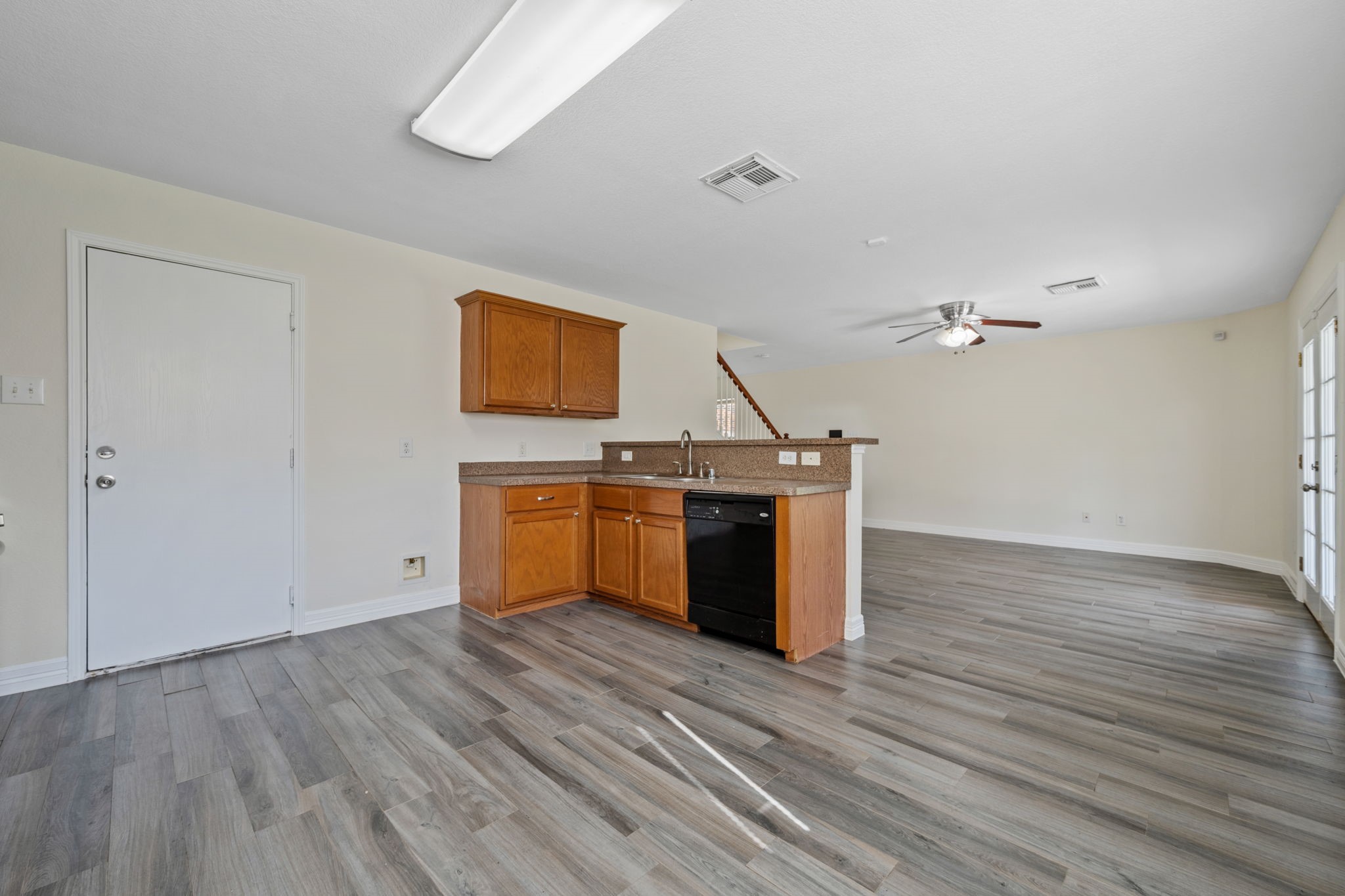 12819 Blue Timbers Court Houston, TX 77044 - Photo 14 of 26 a view of a room with wooden floor