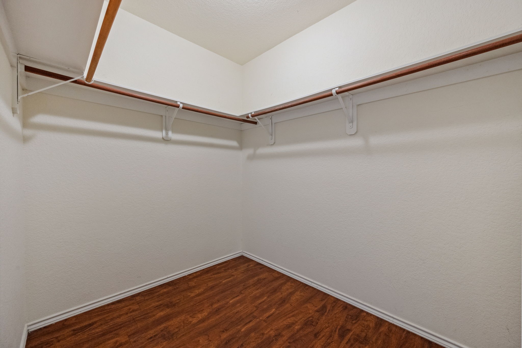 12819 Blue Timbers Court Houston, TX 77044 - Photo 19 of 26 a view of a room with wooden floor