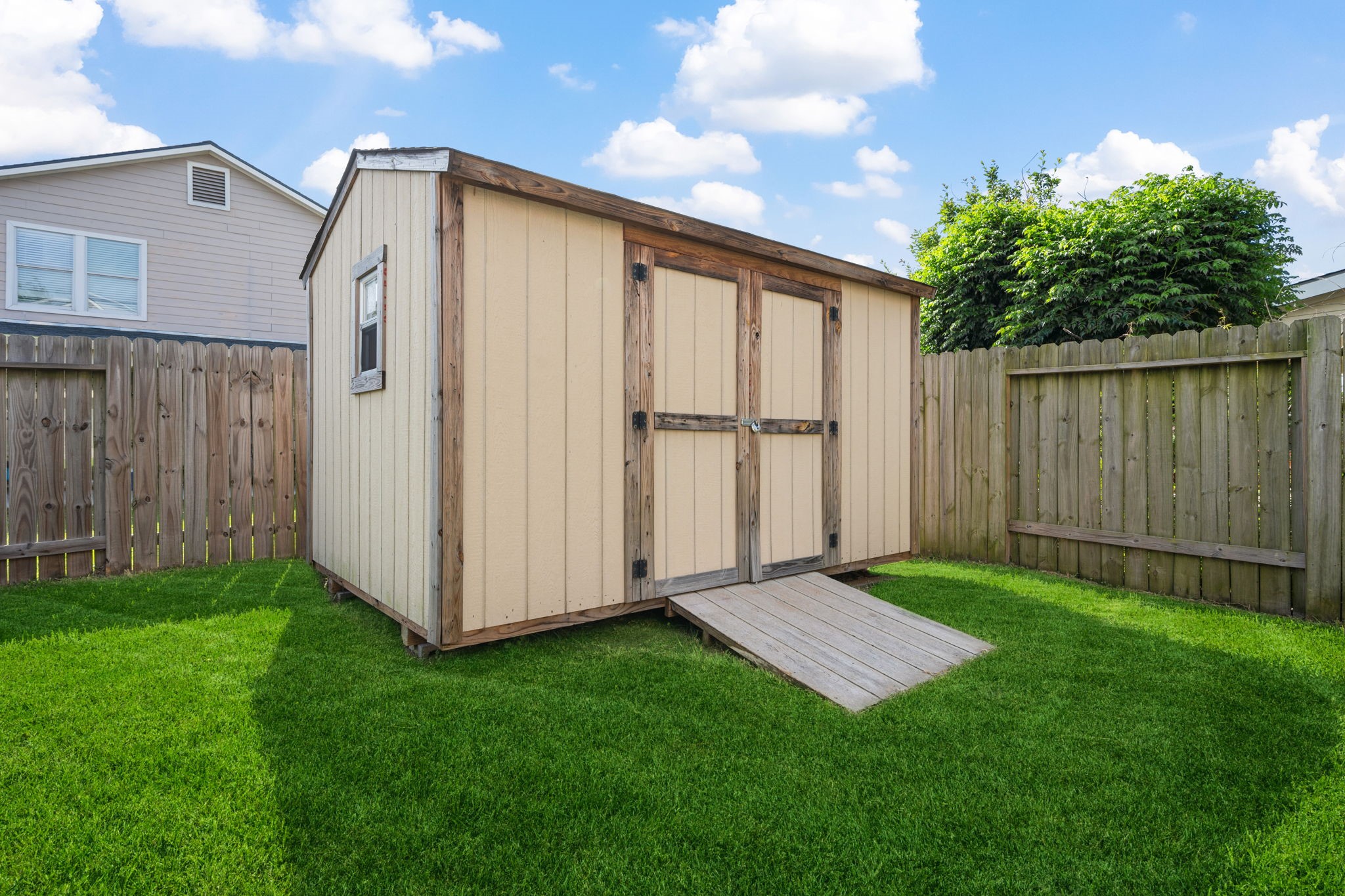 12819 Blue Timbers Court Houston, TX 77044 - Photo 24 of 26 a view of a back yard of the house