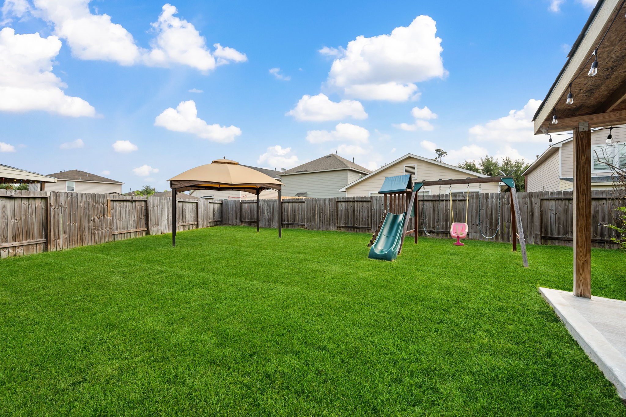 12819 Blue Timbers Court Houston, TX 77044 - Photo 25 of 26 a front view of a house with garden