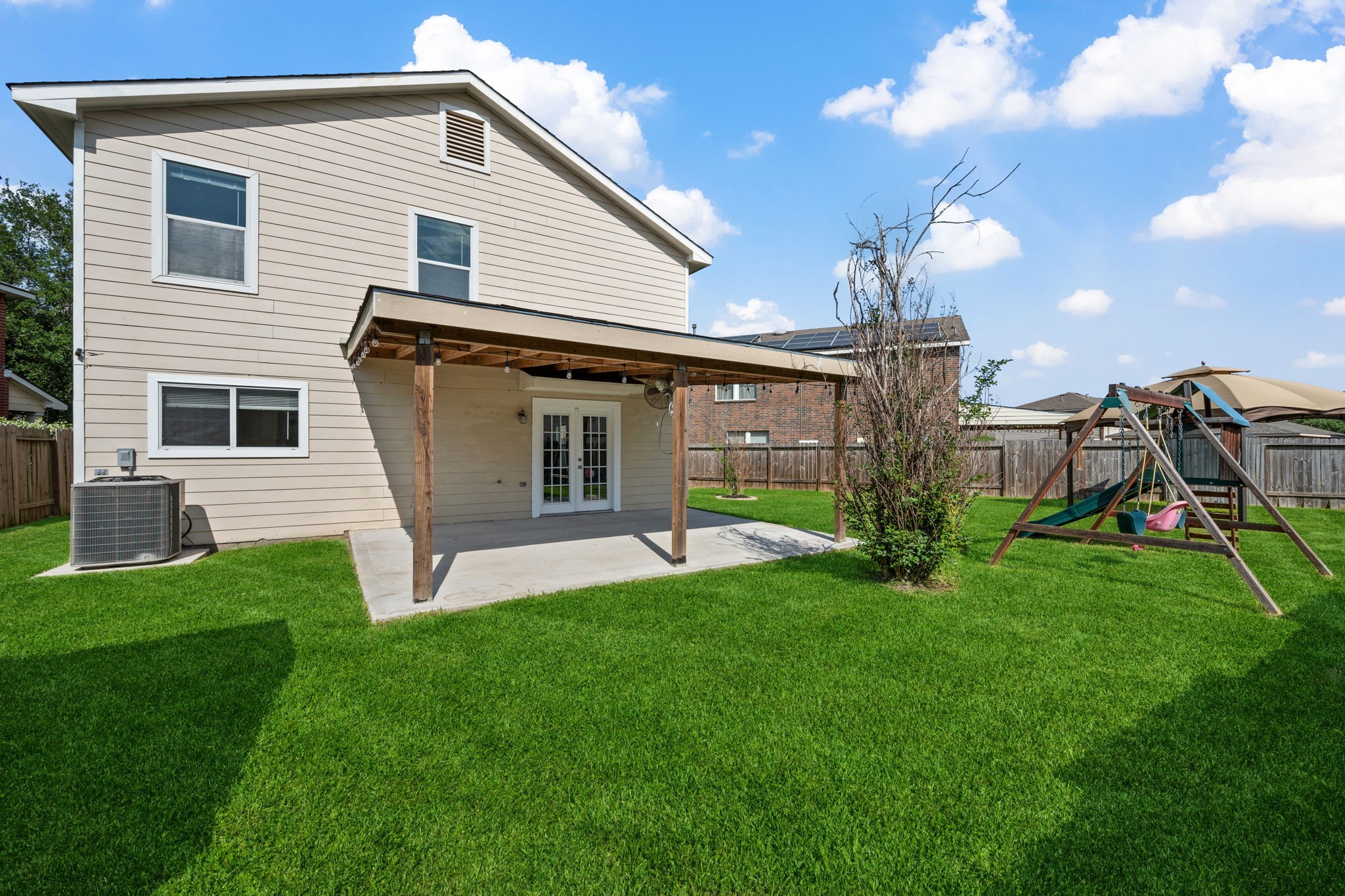12819 Blue Timbers Court Houston, TX 77044 - Photo 4 of 26 a view of a house with a backyard