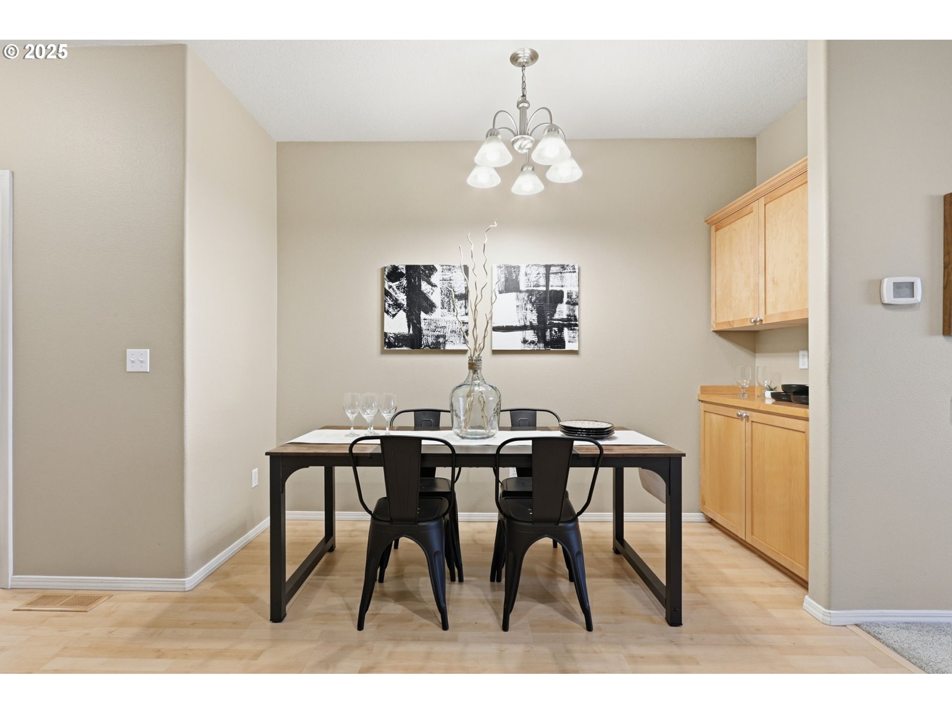 1706 Southwest 172nd Terrace Beaverton, OR 97003 - Photo 11 of 45 a view of a dining room with furniture and chandelier