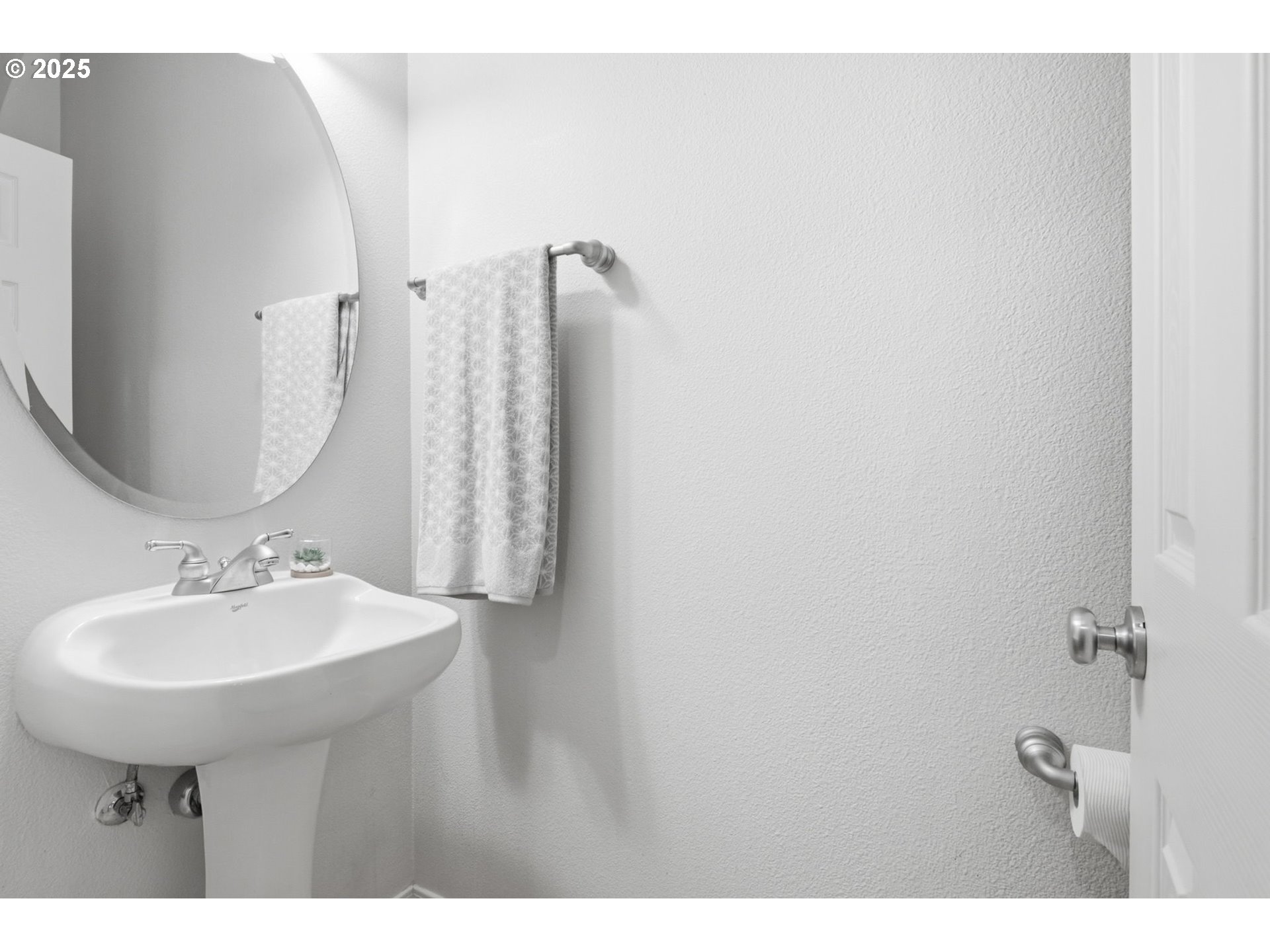 1706 Southwest 172nd Terrace Beaverton, OR 97003 - Photo 15 of 45 a bathroom with a sink a mirror and shower