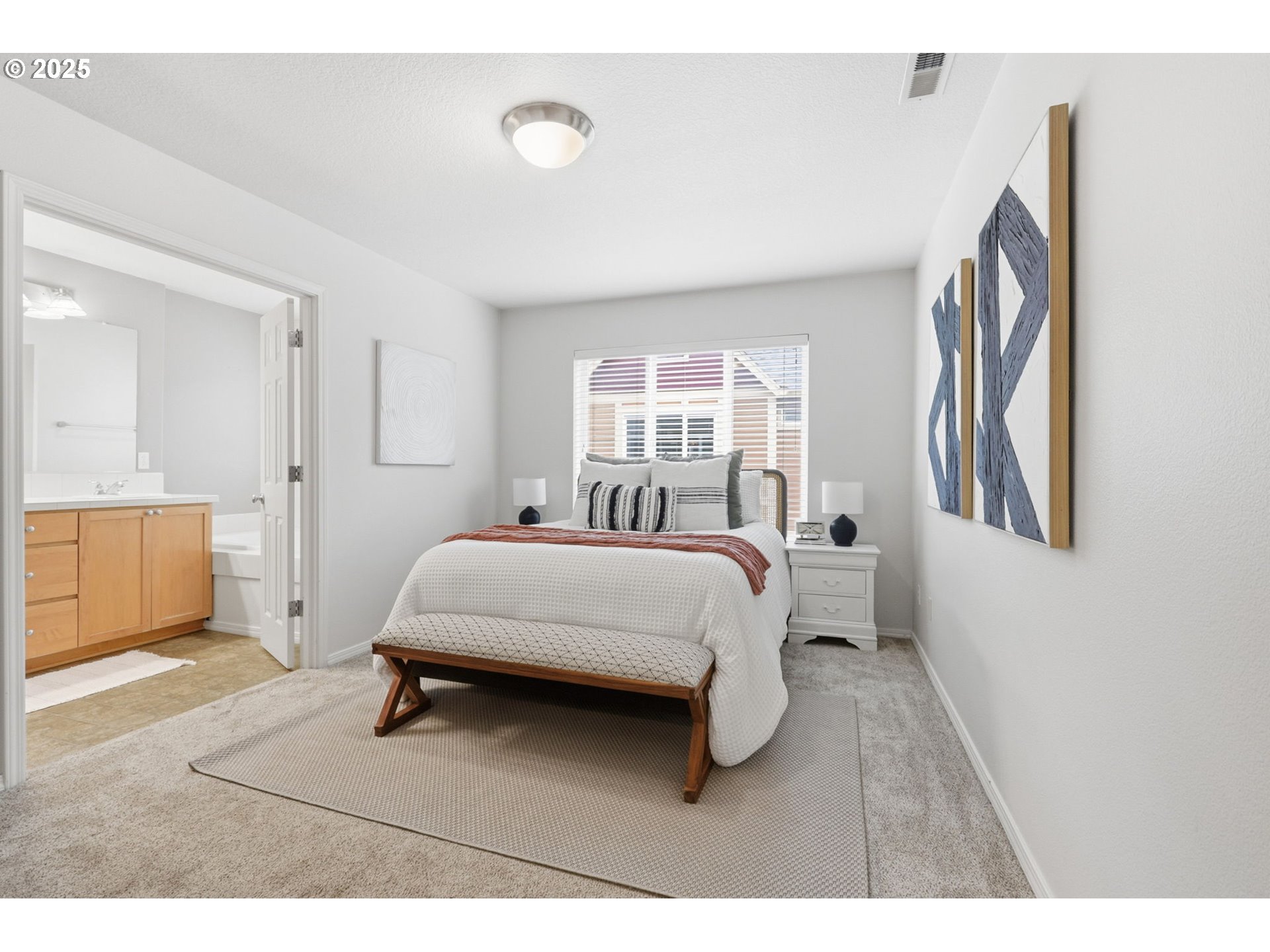 1706 Southwest 172nd Terrace Beaverton, OR 97003 - Photo 19 of 45 a living room with a bed furniture and a window