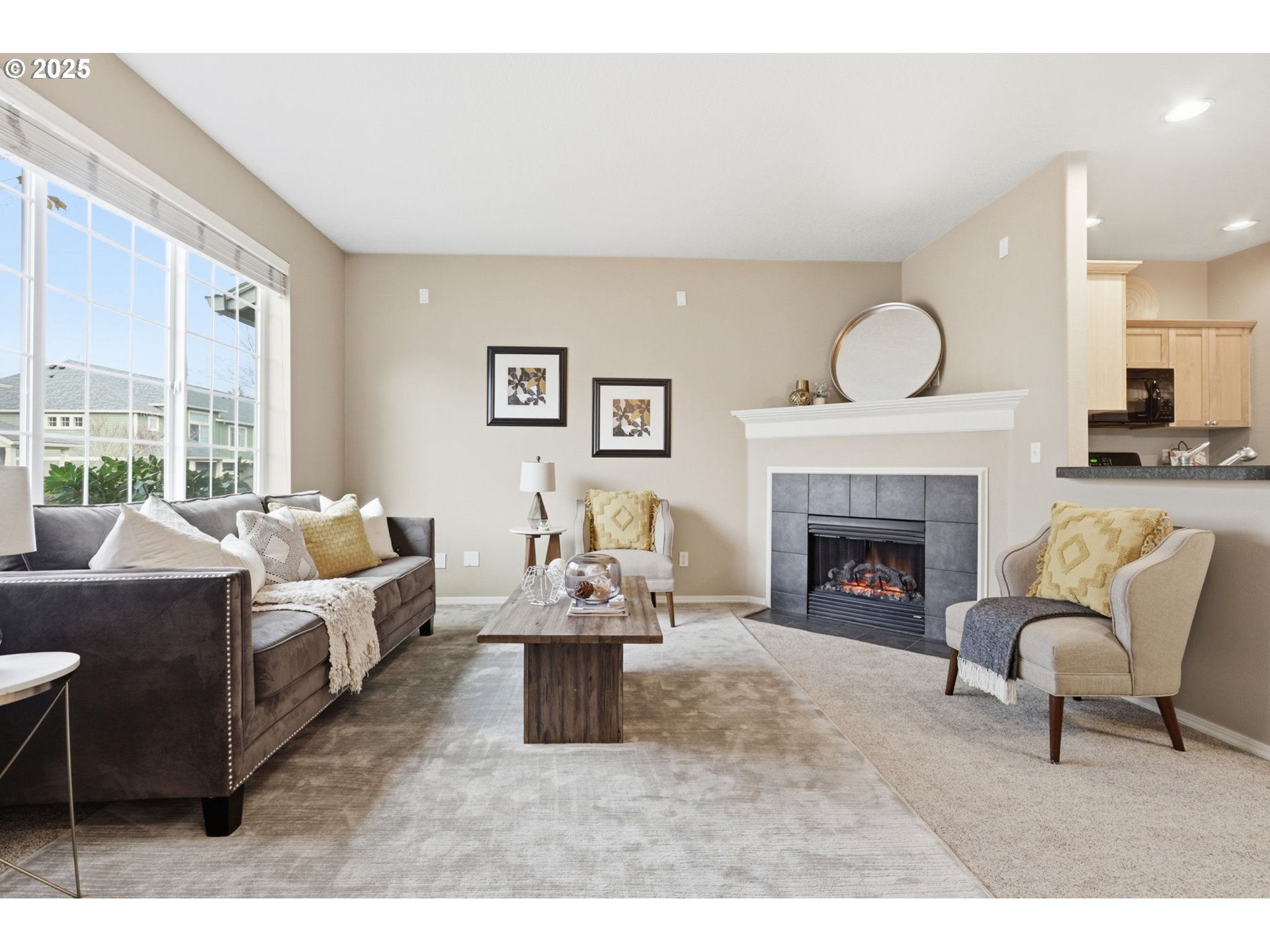 1706 Southwest 172nd Terrace Beaverton, OR 97003 - Photo 4 of 45 a living room with furniture and a fireplace