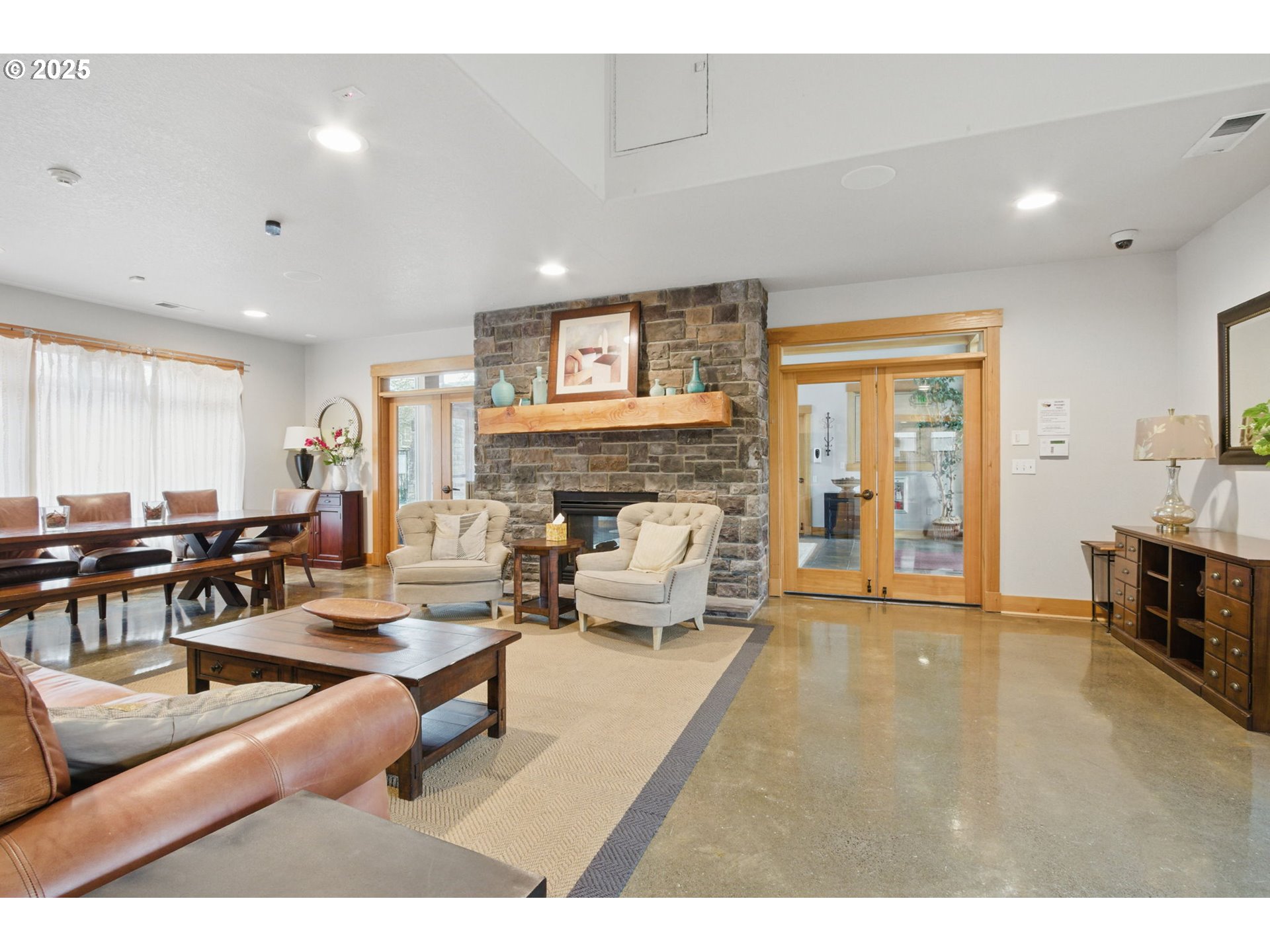 1706 Southwest 172nd Terrace Beaverton, OR 97003 - Photo 39 of 45 a living room with furniture and a fireplace