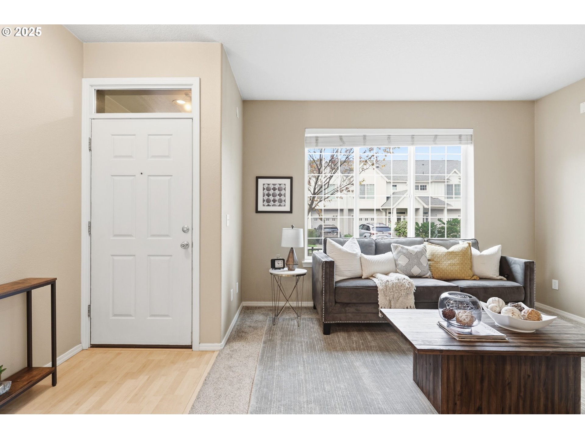 1706 Southwest 172nd Terrace Beaverton, OR 97003 - Photo 5 of 45 a living room with furniture and a large window