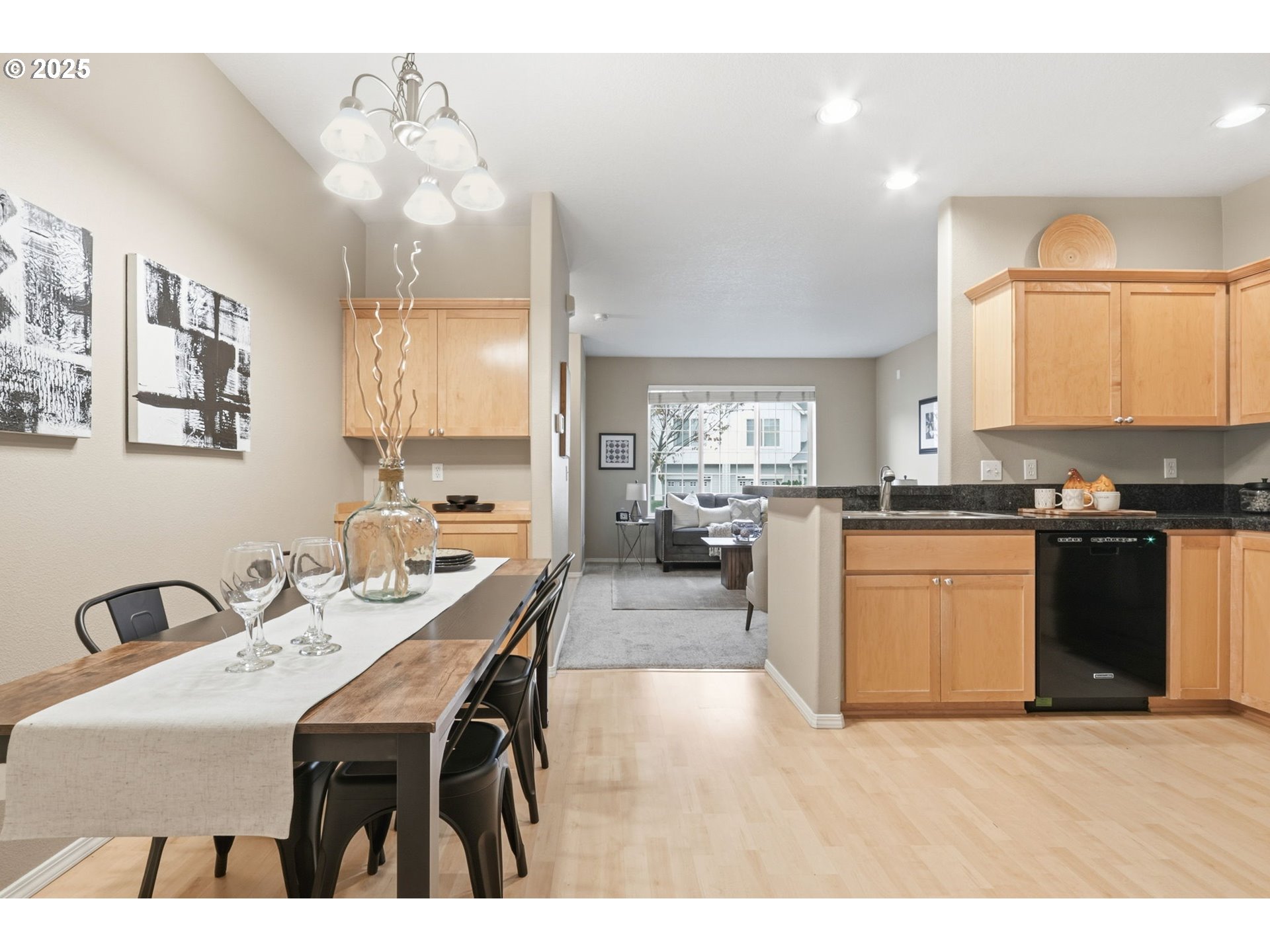 1706 Southwest 172nd Terrace Beaverton, OR 97003 - Photo 10 of 45 a kitchen with granite countertop a sink stove and cabinets