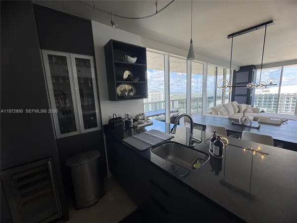 a view of a workspace with furniture