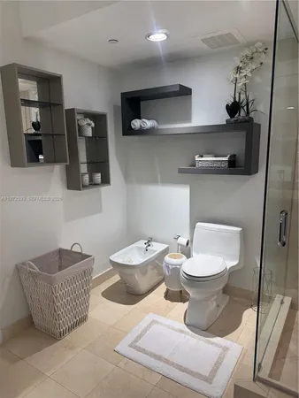 a bathroom with a toilet sink