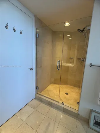 a bathroom with a sink and a shower