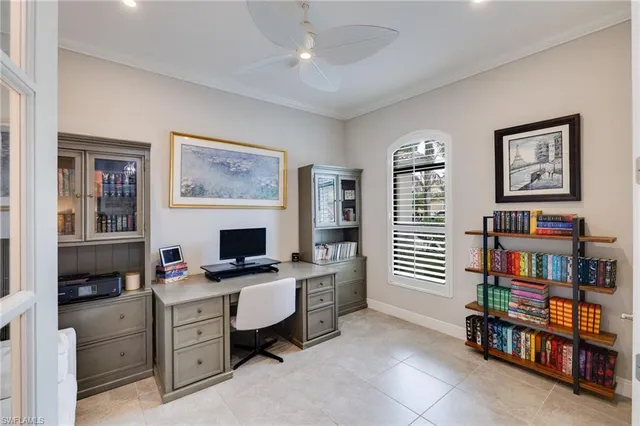 a bed room with bed and a window