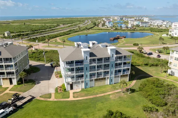 an aerial view of a house with a garden