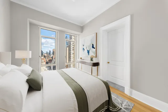 a bathroom with a granite countertop sink a toilet and bathtub