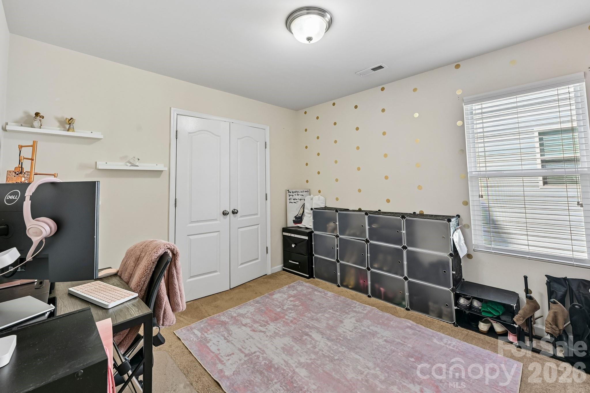 2206 Turtle Point Road Charlotte, NC 28262 - Photo 23 of 28 a room with furniture and wooden floor