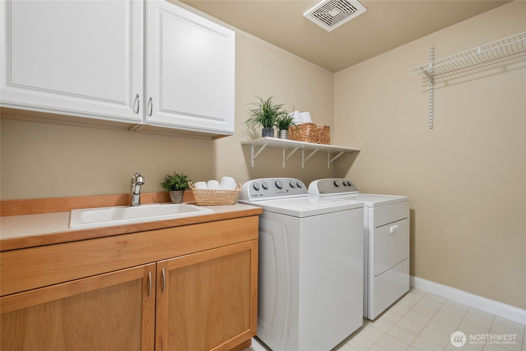 6701 West Crestview Loop Southeast Snoqualmie, WA 98065 - Photo 27 of 40 a utility room with dryer and washer