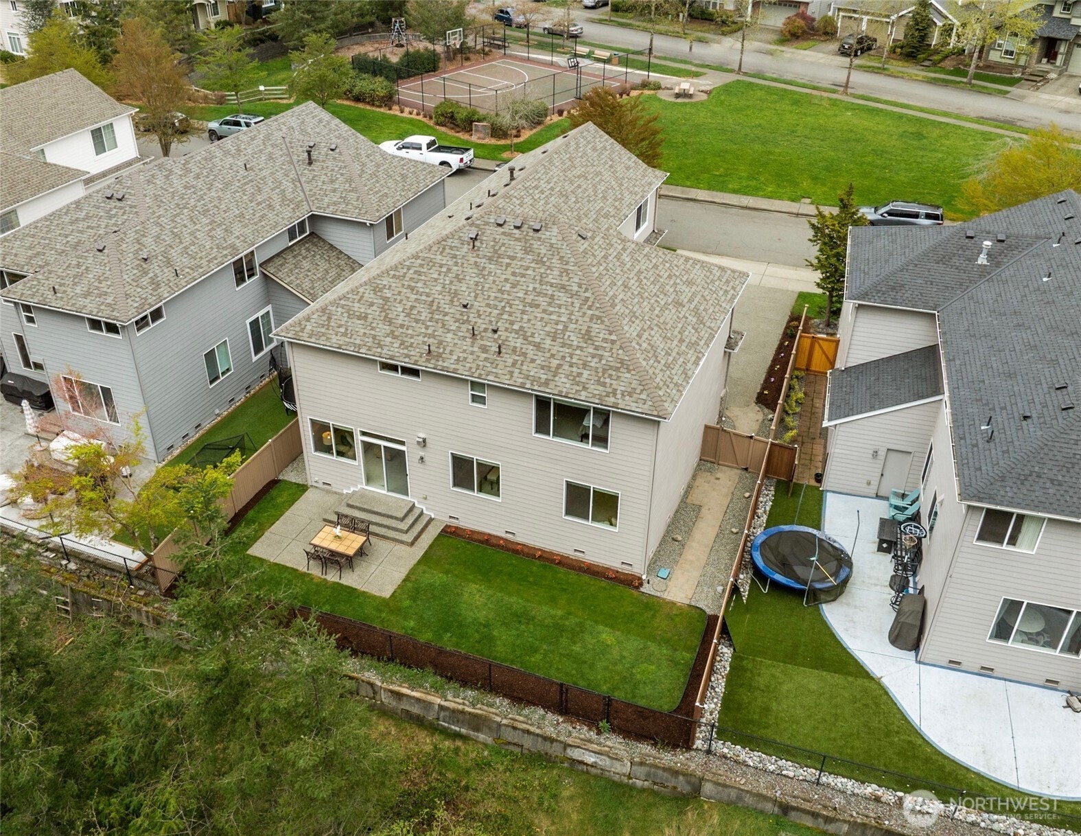 6701 West Crestview Loop Southeast Snoqualmie, WA 98065 - Photo 35 of 40 an aerial view of a house with swimming pool garden and patio