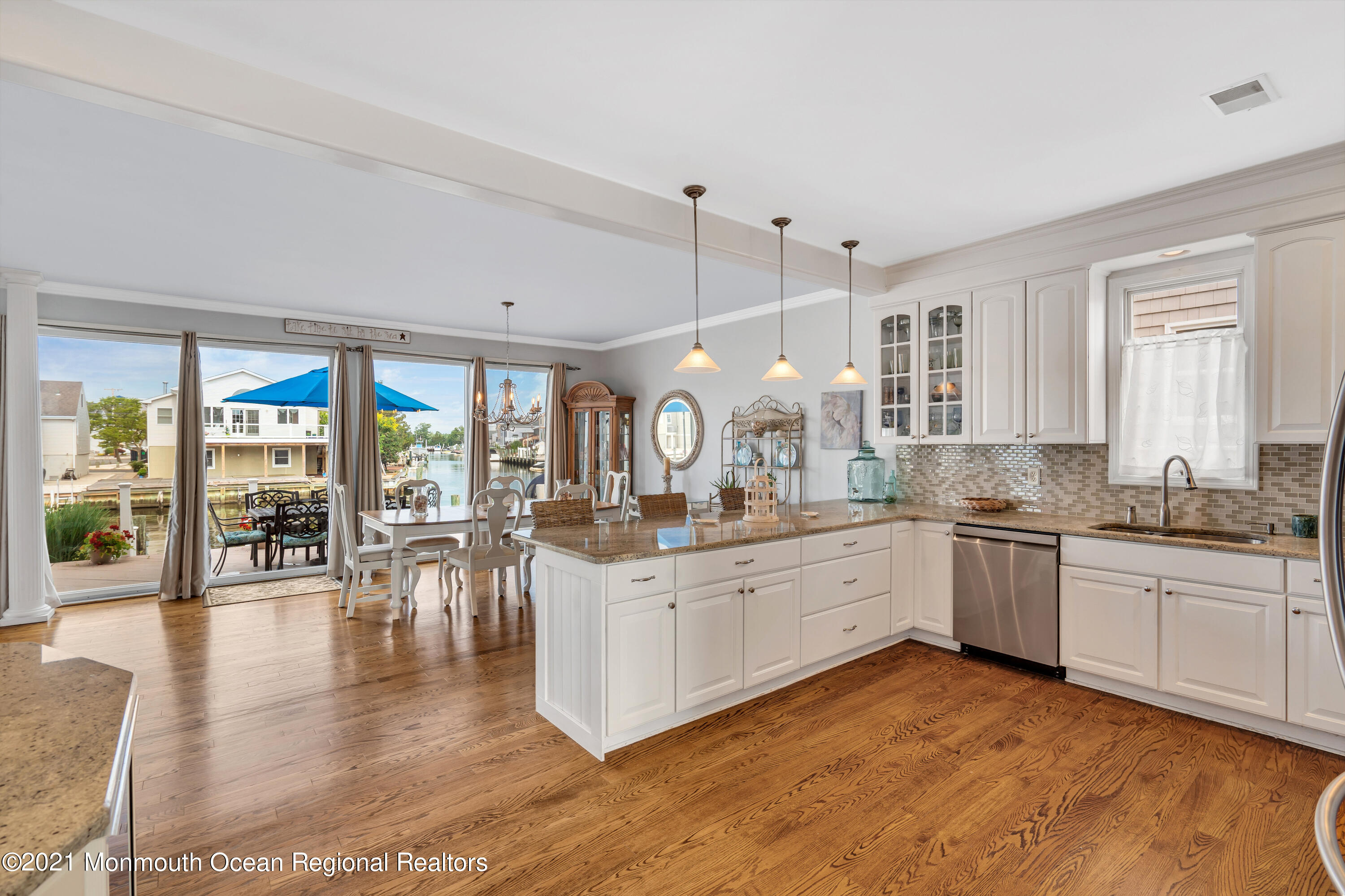 6 Pilot Road Toms River, NJ 08753 - Photo 12 of 35 a kitchen with lots of counter top space and chandelier