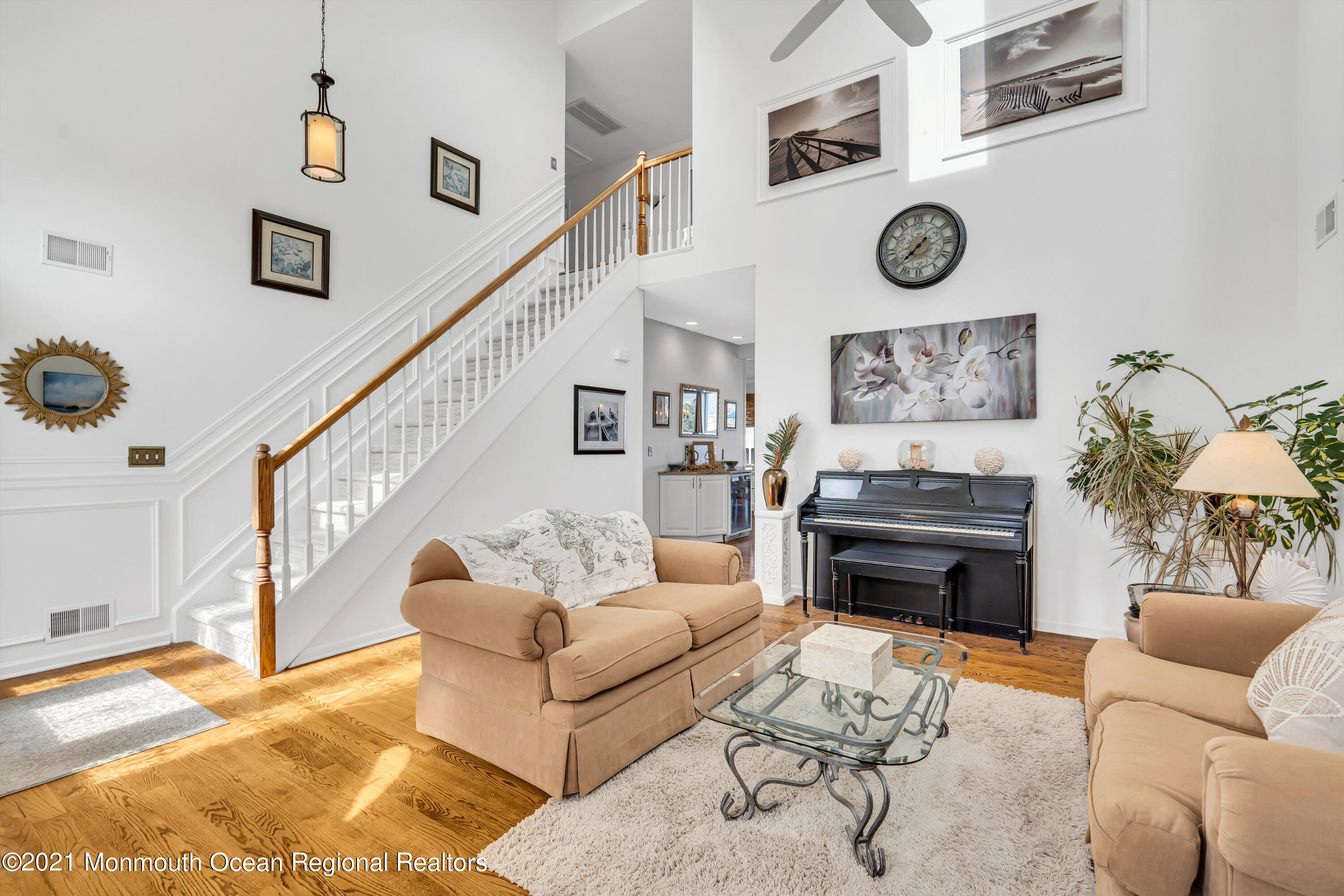 6 Pilot Road Toms River, NJ 08753 - Photo 6 of 35 a living room with furniture and a clock