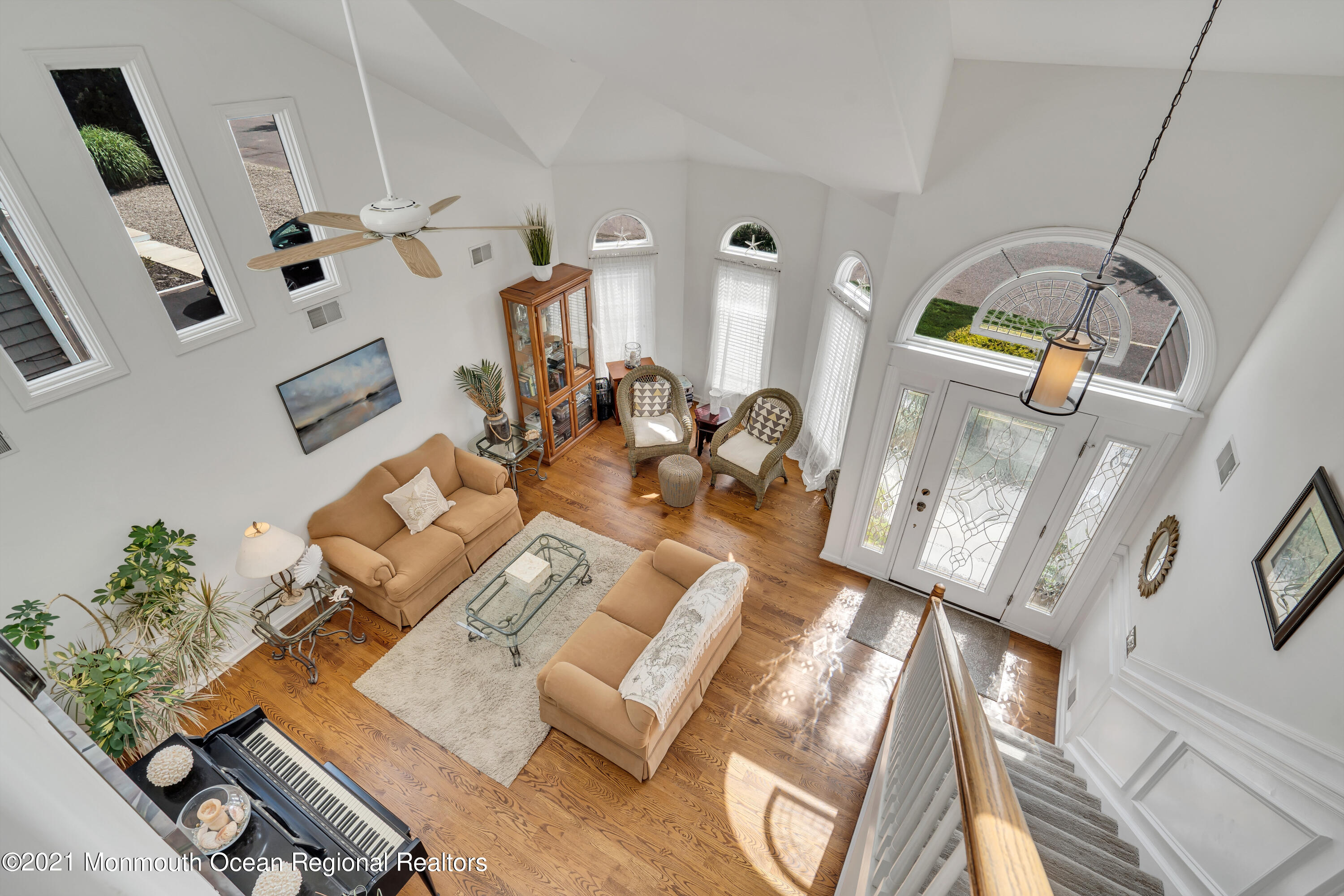 6 Pilot Road Toms River, NJ 08753 - Photo 7 of 35 a living room with furniture and a chandelier