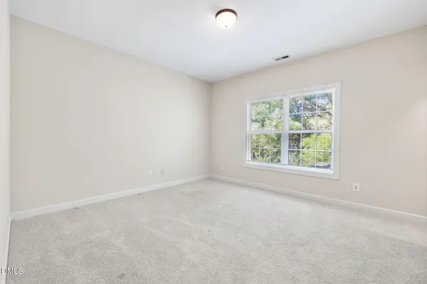 a bathroom with a sink double vanity and a mirror