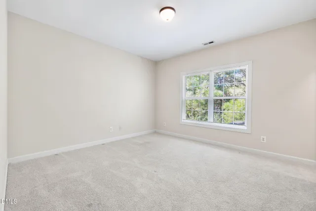 a bathroom with a sink double vanity and a mirror