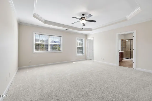 a bathroom with a tub sink and a mirror