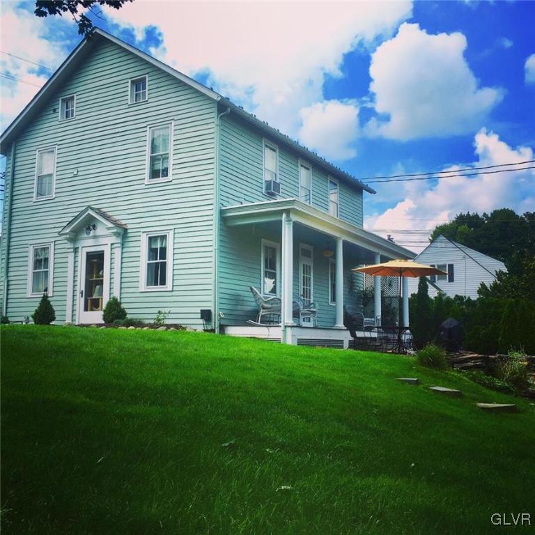 684 Church Road Riegelsville, PA 18077 - Photo 1 of 37 a front view of a house with a garden