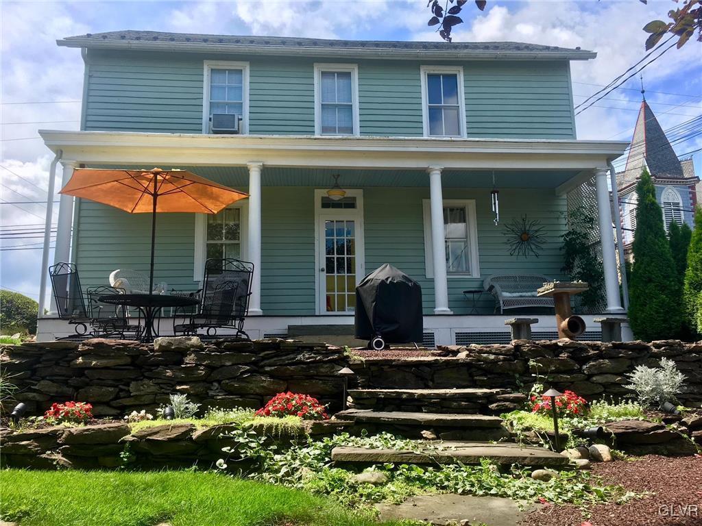 684 Church Road Riegelsville, PA 18077 - Photo 13 of 37 a front view of a house with a garden