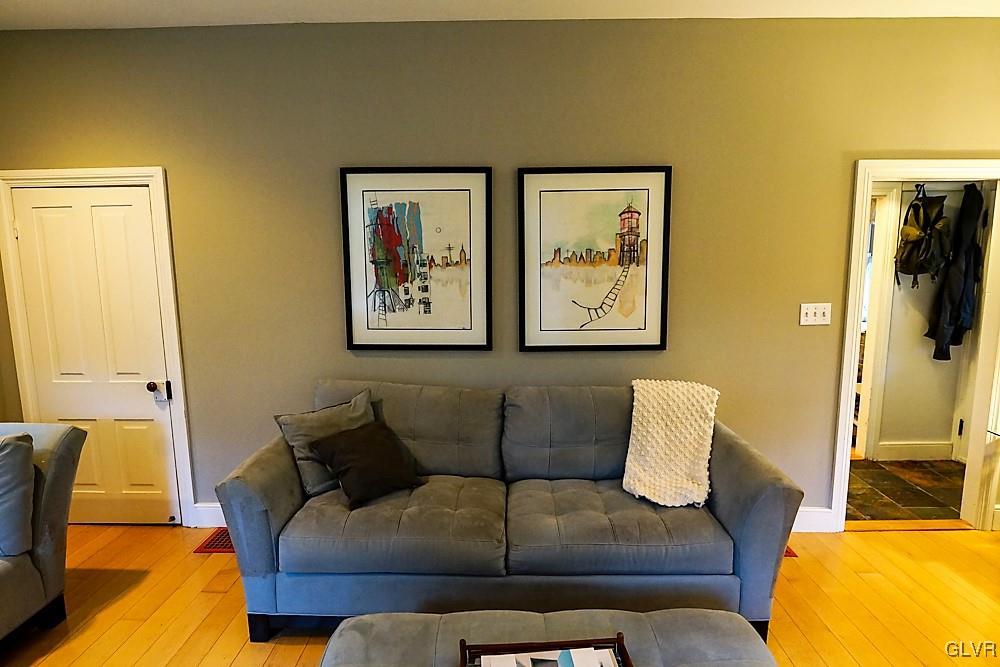 684 Church Road Riegelsville, PA 18077 - Photo 19 of 37 a living room with furniture and a lamp