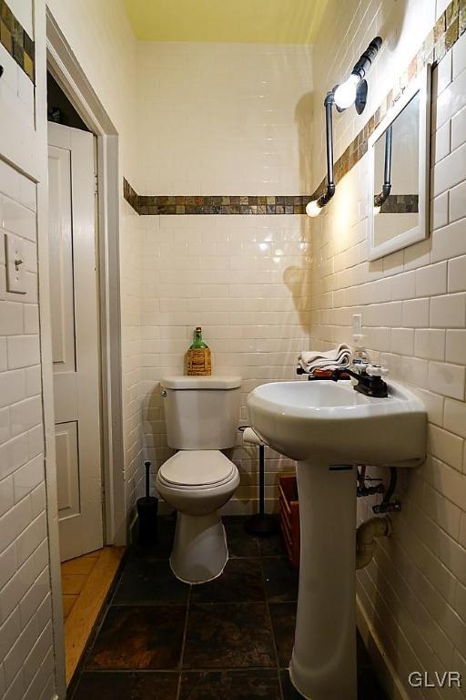 684 Church Road Riegelsville, PA 18077 - Photo 21 of 37 a bathroom with a sink toilet and shower