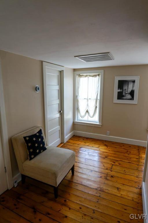 684 Church Road Riegelsville, PA 18077 - Photo 25 of 37 a bedroom with a bed and wooden floor