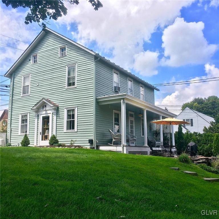 684 Church Road Riegelsville, PA 18077 - Photo 37 of 37 a front view of a house with a garden and plants