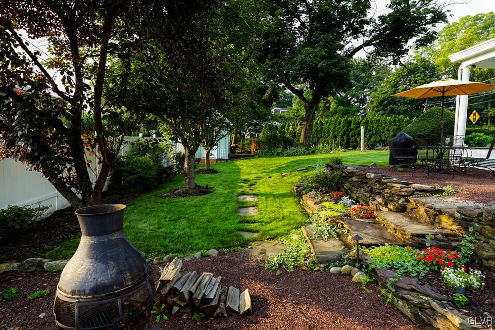 684 Church Road Riegelsville, PA 18077 - Photo 8 of 37 a view of a garden with a patio