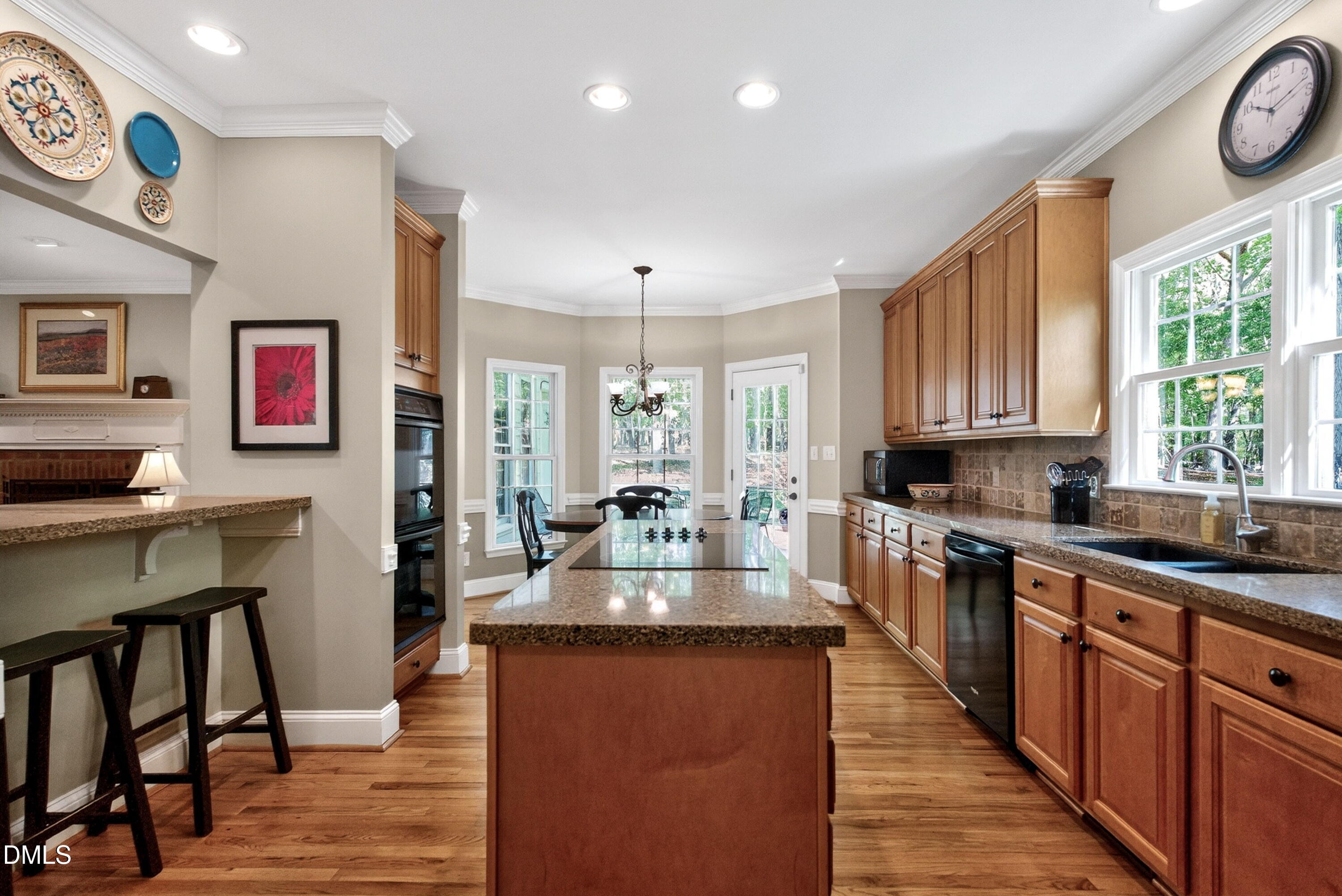 6329 Battleview Drive Raleigh, NC 27613 - Photo 15 of 36 a large kitchen with lots of counter space and window