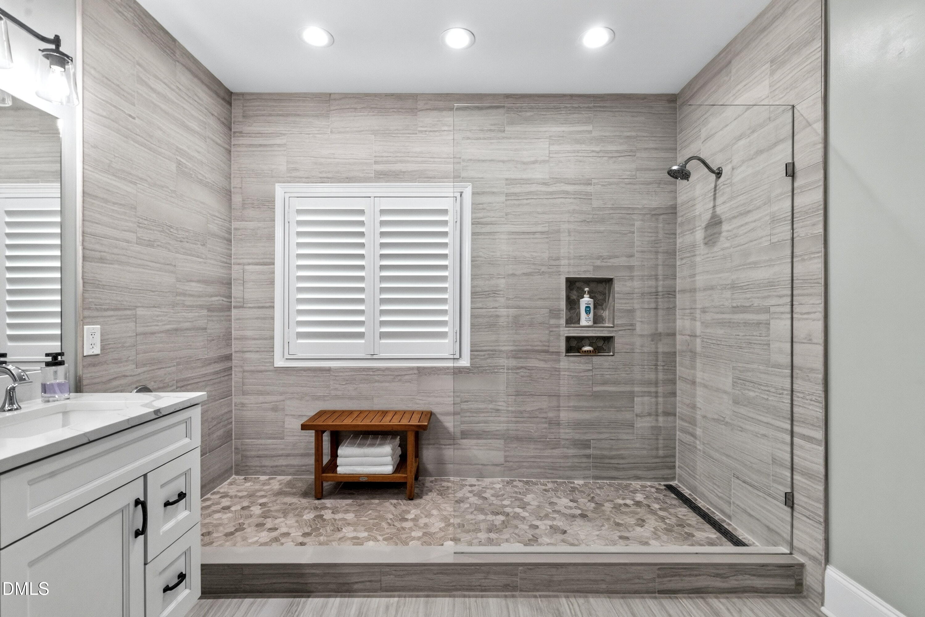 6329 Battleview Drive Raleigh, NC 27613 - Photo 20 of 36 a bathroom with a shower