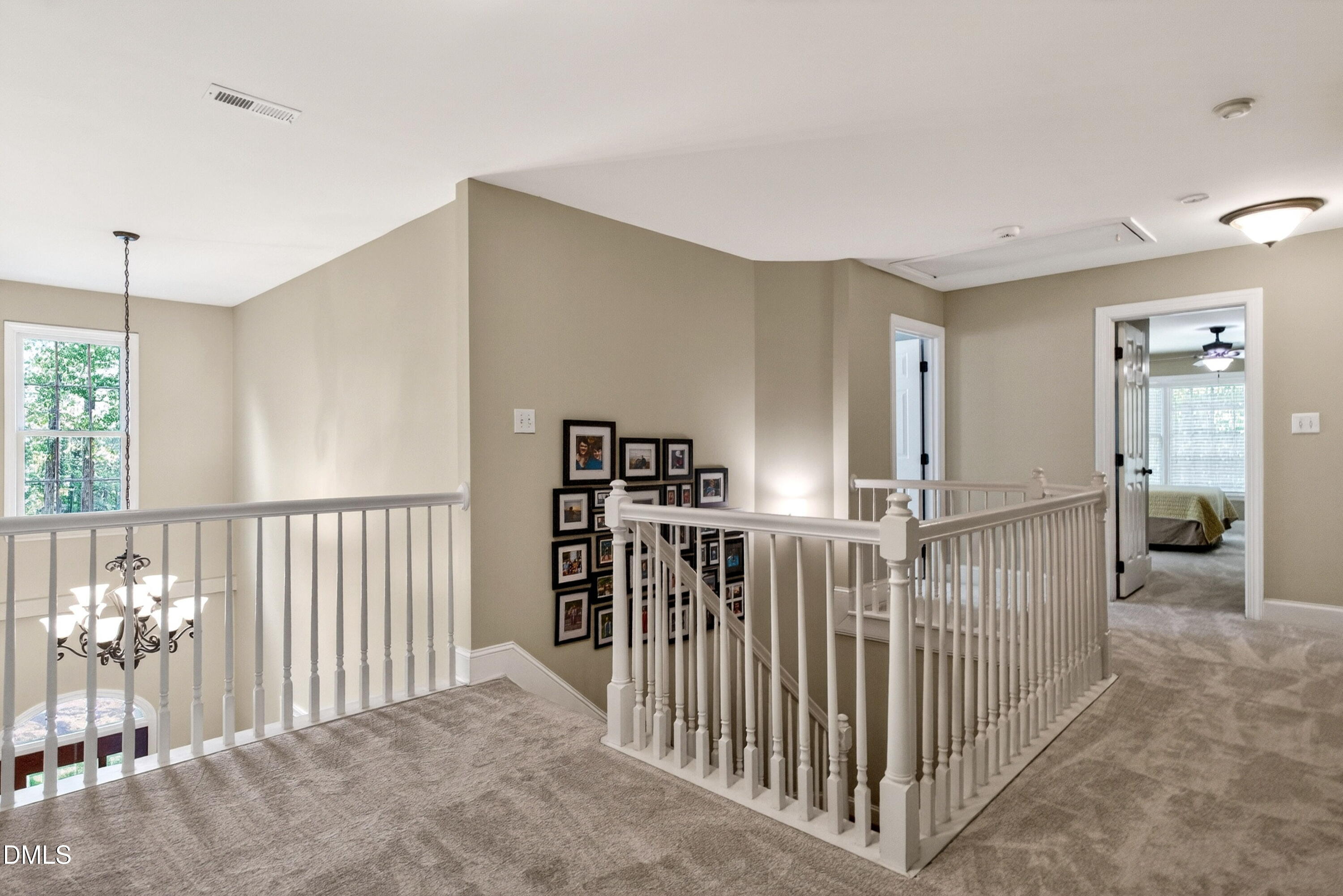 6329 Battleview Drive Raleigh, NC 27613 - Photo 21 of 36 a view of hallway with livingroom